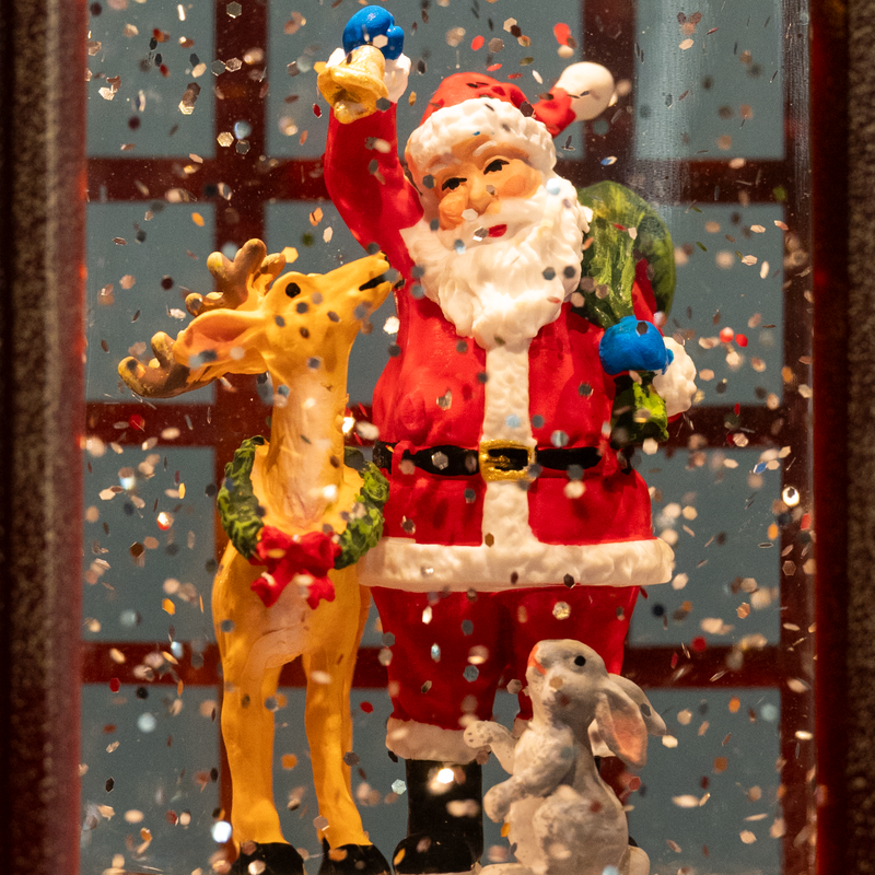 Santa in a PCO Booth Decorative Showpiece