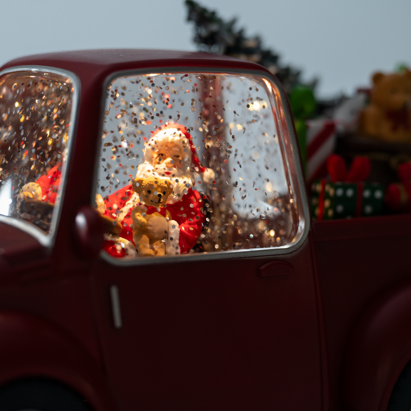 Santa Claus in a Car Decorative Showpiece