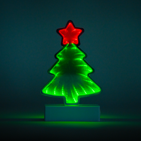Lit Green Christmas Tree with a Red Star Table Top
