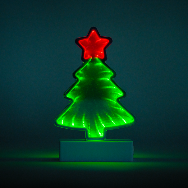 Lit Green Christmas Tree with a Red Star Table Top